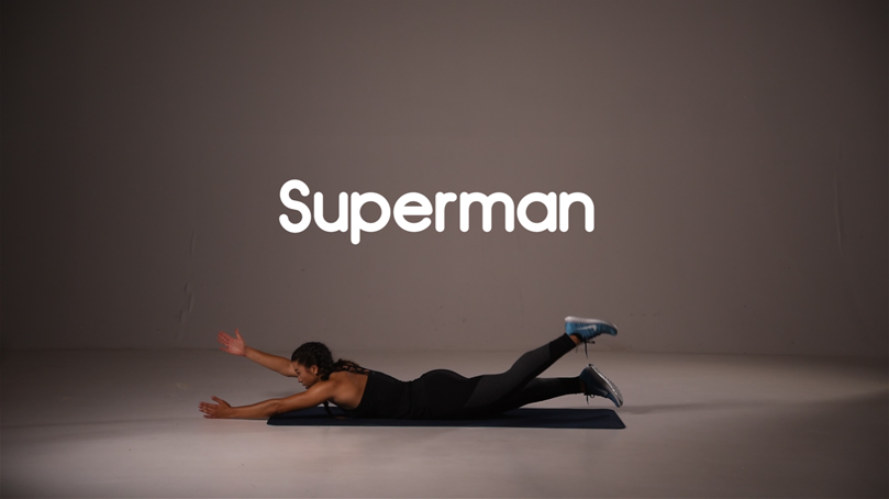 Females Doing Superman Pose During Aerial Yoga
